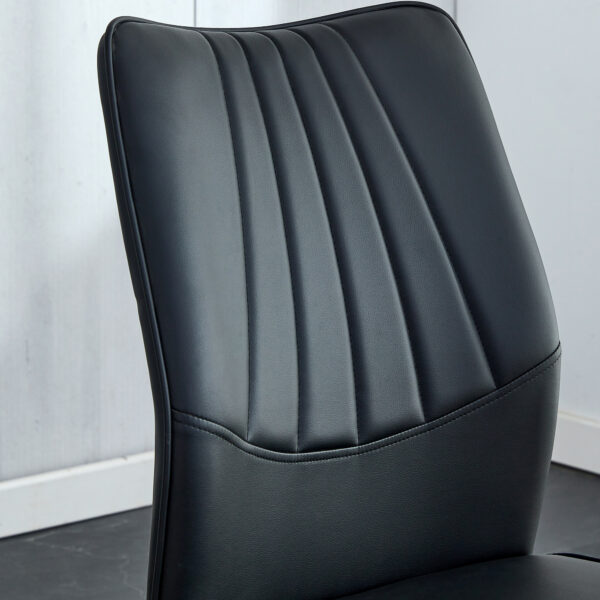 46b28304bf2248a4ab961783446e818c_20240205_e15ade94e9ffa2b52ea6f905f887a73c Four black dining chairs. A medieval modern chair made of PU material with soft cushions, equipped with golden metal legs. Suitable for restaurants and living rooms
