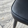 Table and chair set.Modern Black Marble Pattern MDF Dining Set - 55"x31.4"with 4 Black PU chairs with a vertical stripe design on the backrest and black metal legs.Suitable for kitchen,Dining room,etc