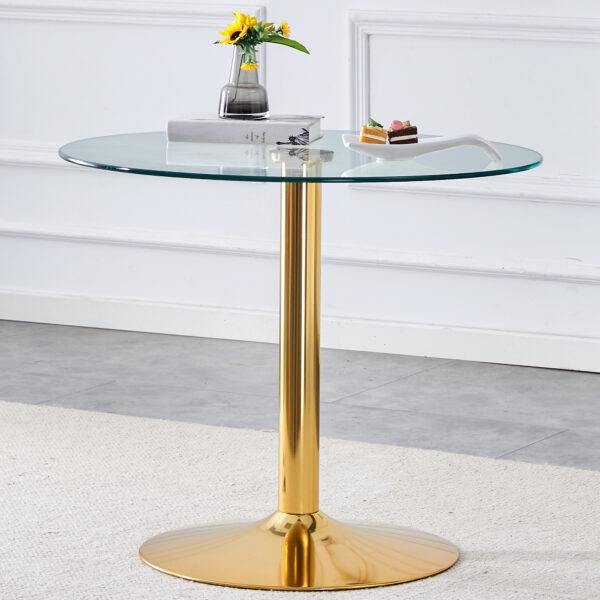 47e01a1956b04feaa266a1d6c51adbd3_143618c83cb102512b0a0f87401a30f0 A 35-inch diameter glass top and a modern, minimalist round dining table with gold metal legs. Ideal for dining rooms, living rooms and meeting rooms.