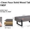 A rustic gray wood grain MDF coffee table with black metal legs - an elegant space in natural wood tones
