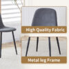 Table and chair set.79"x31.5" with X-shaped Black Metal Table Legs,Wood Grain Textured MDF Crossbeam.Paired With 6 Chairs Made Of Dark Gray Lnen Fabric.Iron pipe spraying Legs.