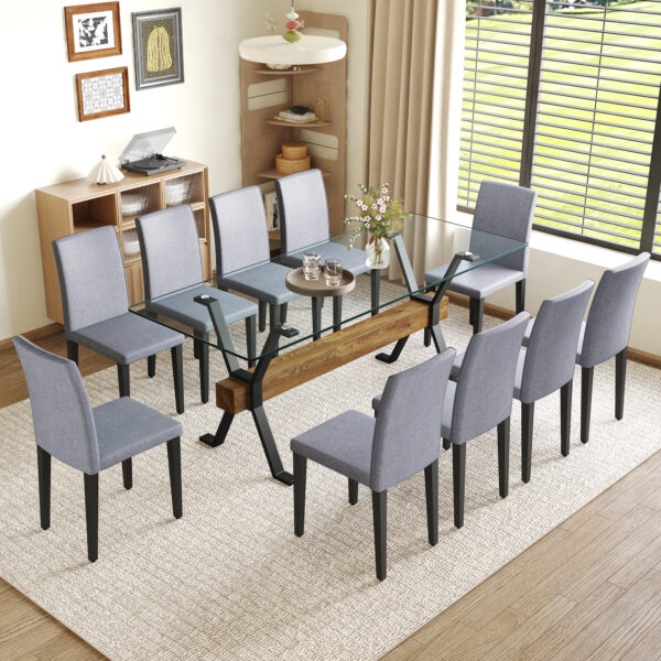 4c1e4ae8b1c245678443ea0b08109fc9_579cfb70e0ae324a78ab23fa5d389c23 Table and chair set.79"x31.5" Inch Tempered Glass Tabletop With X-shaped Black Metal Table Legs,Wood Grain Textured MDF Crossbeam.Paired With 10 Light Gray Linen-Cotton Dining Chairs.