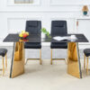 Table and chair set.63"x31.5x30"Black Texture With Lines Patterned Sintered Stone Table with Golden Stainless Steel Butterfly Legs.Paried With 4 Black High-quality PU Chairs With Golden Metal Legs.