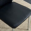 Four black dining chairs. Modern chairs from the Middle Ages. Made of PU material cushion and silver metal legs. Suitable for restaurants and living rooms C-009