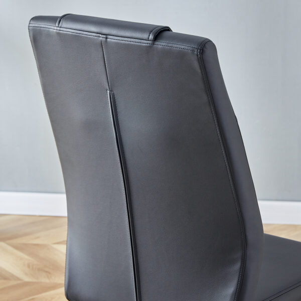 517a058b748d46cc9ae751307409deaa_88c44029ed12dd26b129e6059f2285c4 Table and chair set.63"x31.5x30" Luxurious Snow Mountain Patterned Sintered Stone Table with Silver Stainless Steel Butterfly Legs.Paried With 6 Black High-quality PU Chairs With Arched Metal Legs.