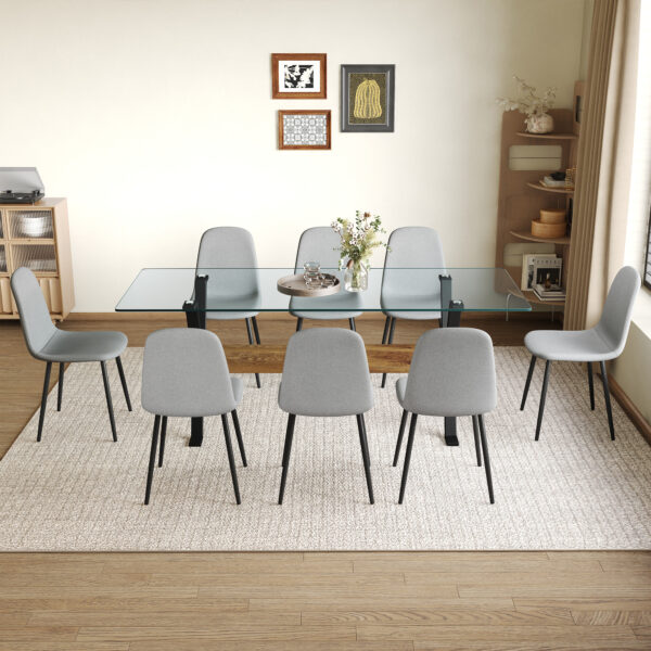 576e875ed80b435ea3ed002219330bd7_698b76ac0987589648731dd09974caf2 Table and chair set.79"x31.5" with X-shaped Black Metal Table Legs,Wood Grain Textured MDF Crossbeam.Paired With 8 Chairs Made Of Light Gray Lnen Fabric.Iron pipe spraying Legs.