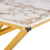 A coffee table is made of rock slab material, with a natural and smooth marble pattern on the surface, which complements the modern design of the golden metal legs and adds a touch of fashion.47*23.6