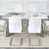 Table and chair set.63"x31.5x30" Luxurious Pandora patterned Sintered Stone Tabletop with Silver Stainless Steel Butterfly Legs.Paried With 6 White High-quality PU Chairs With Arched Metal Legs.