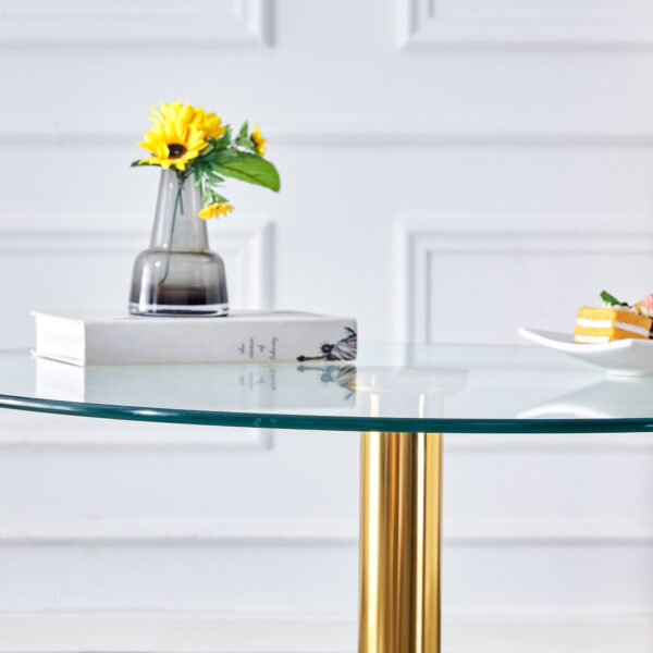 5a81c31ea5ec4ccb84d77861900e1528_87be2019cd73de74868e91e87cdf32a8 A 35-inch diameter glass top and a modern, minimalist round dining table with gold metal legs. Ideal for dining rooms, living rooms and meeting rooms.