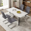Table and chair set.63"x31.5x30" Luxurious Snow Mountain Patterned Sintered Stone Table with Silver Metal Butterfly Legs.Paried With 4 Dark Gray High-quality PU Chairs With Arched Metal Legs.