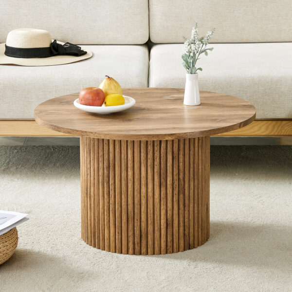 63f2b9d60abb4c969795b61ac68d8b8e_21b9ce4afa1b05851e96b861465e75df A modern circular coffee table with a diameter of 27.5 inches interprets home aesthetics and practicality. MDF material,cylindrical table leg design.Becoming the visual focal point of home decoration.