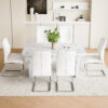 Table and chair set.63"*35.4" White Imitation Marble Pattern MDF Dining Table Set - 6 Soft and Comfortable White PU Chair With Arched Metal Silver Leg.Create Your Exclusive Low-Key Luxury Space.