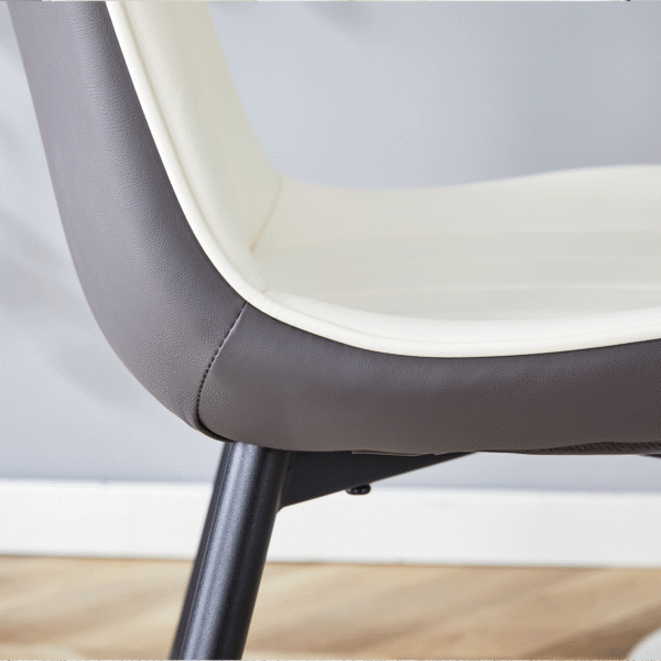 65505f80a18f413bb27cbdc14cdf24f0_63a52f22d7e1eb2ba12f6d25985ec7a9 Extended Seat Cushion PU Dining Chair Set - Four Pieces.Smooth line design.Can integrate well into various modern home decoration styles.White and Dark Gray Splicing Colors.