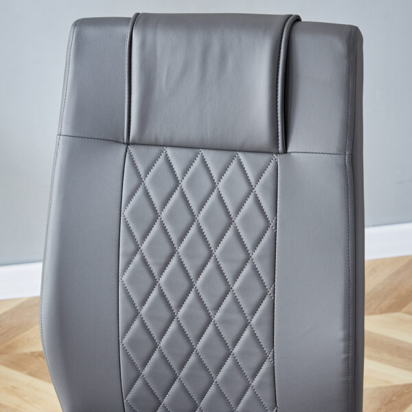 65b1e20329e14484bb3840993dcb75d1_54c47a98c00950f432b0a21b33cef8dd Table and chair set.63"x31.5x30" Luxurious Snow Mountain Patterned Sintered Stone Table with Silver Metal Butterfly Legs.Paried With 4 Dark Gray High-quality PU Chairs With Arched Metal Legs.