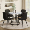 Table and chair set.A Modern Minimalist Circular Dining Table With A Diameter Of 33.3 Inches.Paired With 4 Black Minimalist Ergonomic PU Dining Chairs With Extended And Curved Seat Cushions.