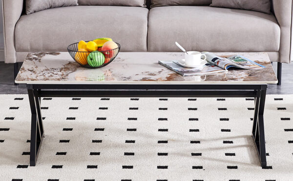 686b5e1434104a75a5f1dd31f4975c91_1a42102ea2d1d12b24e4150d9dc56c5a A coffee table is made of rock slab material, with a natural and smooth marble pattern on the surface, which complements the modern design of the black metal legs and adds a touch of fashion.47*23.6