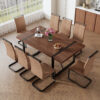 Table and chair set.Industrial Style Walnut-Colored Rectangular Dining Table - 71"x39.3" Large Size.Paired with 8 brown technology fabric chairs with Featuring arched black Metal legs.
