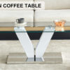 Modern minimalist coffee table. Transparent tempered glass tabletop with silver MDF pillars. Suitable for living room and dining room