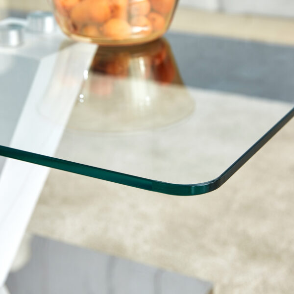 6b7898a261ae4b65b9f76185597ad53d_20240206_0bbbecfece88de22ea45fa5586248186 Modern minimalist coffee table. Transparent tempered glass tabletop with silver MDF pillars. Suitable for living room and dining room