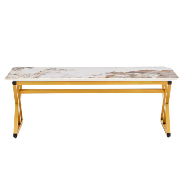 6b8efb13de0e481a97cb9eea0d804e2b_2c7093a691c76f9068d8ed3d23ef130a A coffee table is made of rock slab material, with a natural and smooth marble pattern on the surface, which complements the modern design of the golden metal legs and adds a touch of fashion.47*23.6