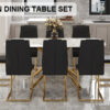 Table and chair set.Modern Luxurious Tempered Glass Dining Table Set with Gold Metal Legs and 8 PU Chairs.White marble-patterned sticker tabletop,black chairs with gold metal legs.