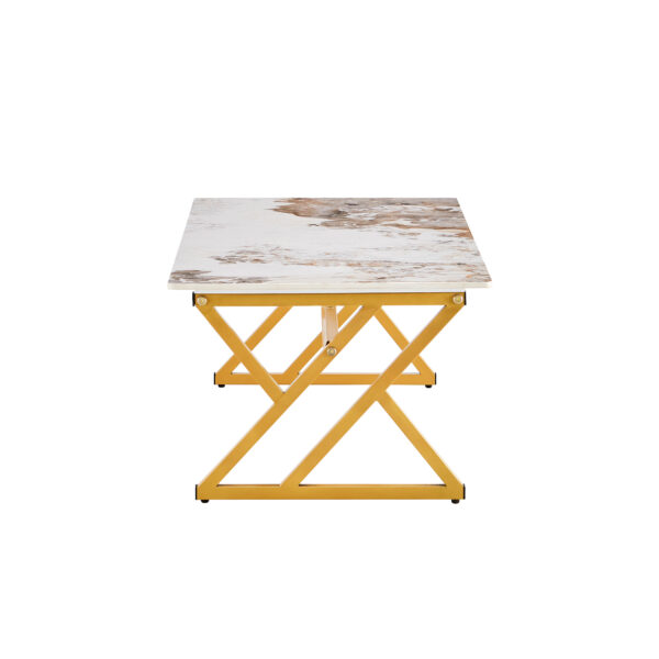 6ec22b89b4e747508b4df177480ffad3_ccd1444d1cd01310835e03ca7040ea21 A coffee table is made of rock slab material, with a natural and smooth marble pattern on the surface, which complements the modern design of the golden metal legs and adds a touch of fashion.47*23.6