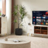 Deluxe Sculpted Modern Fashion Geometric Style TV Stand, Aluminum Frame Tempered Glass Door 4 Drawer Chest with Adjustable Metal Feet ,White,59.9"L x 15.7"W x 21.7"H