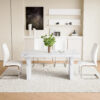 Table and chair set.63"*35.4" White Imitation Marble Pattern MDF Dining Table Set - 4 Soft and Comfortable White PU Chair With Arched Metal Silver Leg.Create Your Exclusive Low-Key Luxury Space.
