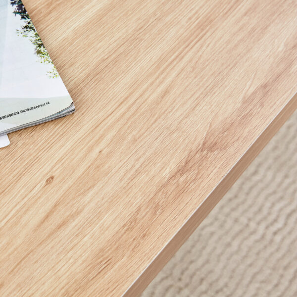The top of the coffee table is made of medium density fiberboard and wooden stickers, with transparent tempered glass on both sides. The design is simple and elegant, with a sturdy structure.