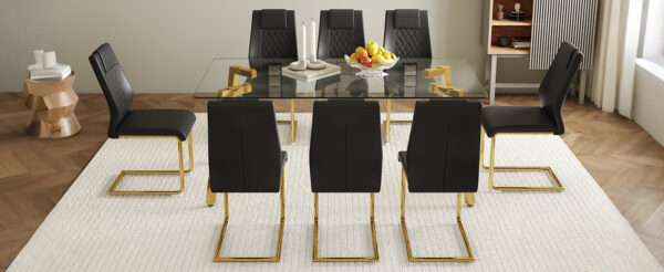 73f229ff1ff845629c0bbe25291c90a9_52da098cee29b66299d53565056ab1a5 Table and chair set.71 * 35.4 inch rectangular dining table.Tempered Glass Tabletop,Golden 7-shaped Metal Table Legs.Paried With 8 Black High-quality PU Chairs With Arched Metal Legs.W1151S03301