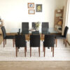 Table and chair set.79"x31.5" Inch Tempered Glass Tabletop With X-shaped Black Metal Table Legs,Wood Grain Textured MDF Crossbeam.Paired With 8 Black PU Dining Chairs with Walnut Color Metal Leg.