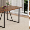A minimalist retro rectangular dining table with a specially textured top and black metal legs.Contemporary Minimalist MDF Dark Wood Textured Tabletop.Able To Give People A Visual Beauty With Rules.