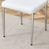 Set of Eight White PU Comfort Dining Chairs (17.7"x25").Dining chair with extended backrest,WHITE PU,Silver metal legs,Suitable for various places such as family restaurants, hotels, coffee shops,etc.