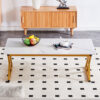 A coffee table made of rock slab material, with a smooth and natural surface that complements the modern design of the golden metal legs, making it suitable for living rooms of all sizes.47*23.6