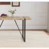 A minimalist retro rectangular dining table with a specially textured top and black metal legs.Contemporary Minimalist MDF Wood Color Textured Tabletop.Able To Give People A Visual Beauty With Rules.