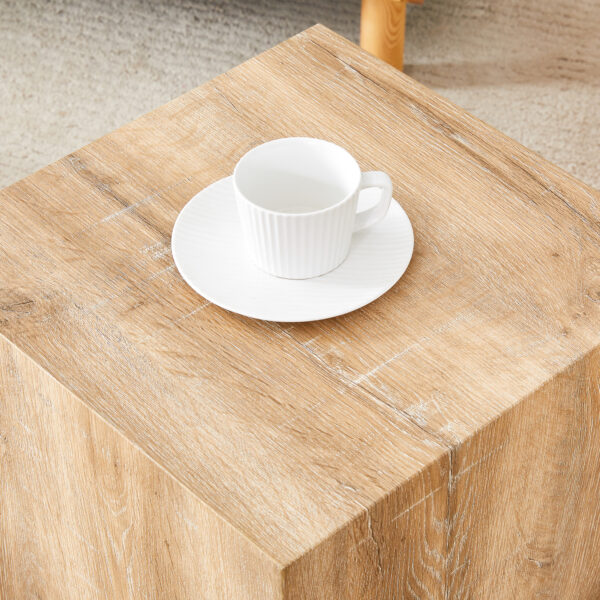 79f887620241439fb1219a9c55cba367_7469fddf1187ee6e9e5f58ad788344dc Elevate your living space with this square modern MDF coffee table that showcases smooth, light wood color texture patterns. It is characterized by stylish design.15.7*15.7*15.7