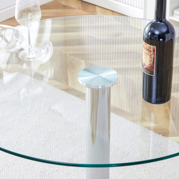 7b41eae64cf6458fa1c5211204ddaf8a_2b88dd7f824ed3936df641c356ab8eb6 A glass tabletop with a diameter of 35 inches and a modern minimalist circular dining table with electroplated silver metal legs. Suitable for restaurants, living rooms, and conference rooms.BT-1166