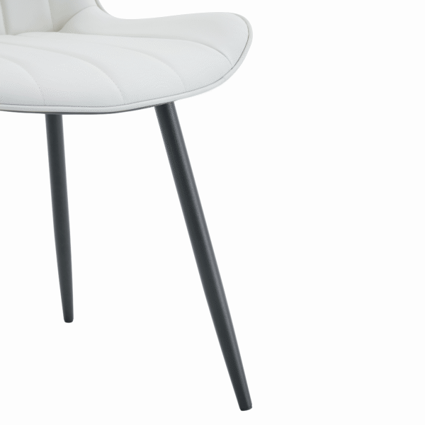 7bedc48587404dd68a0e39a15d1aad62_b5c2a8fde651fdba137b0483ba68e8e9 Extended Seat Cushion PU Dining Chair Set - Four Pieces.Smooth line design.Can integrate well into various modern home decoration styles.White and Dark Gray Splicing Colors.
