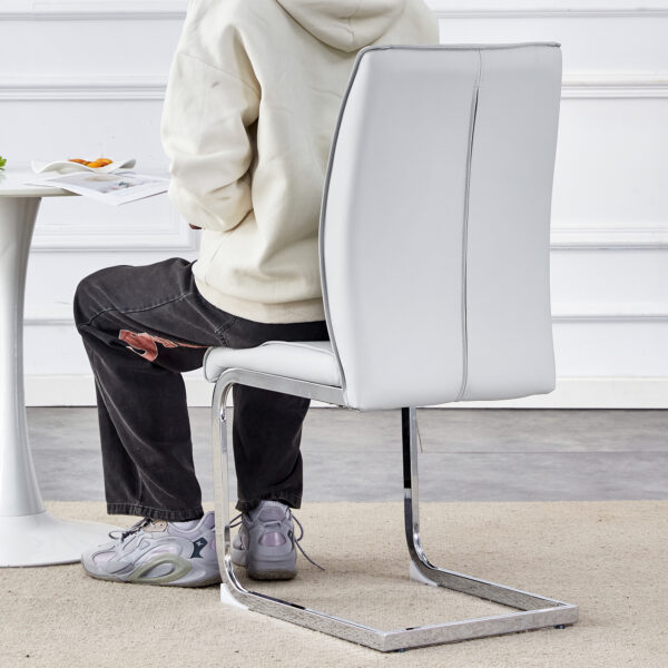 7c884538352d4e31a07dfec97e5e0a66_4b3134f9c3027a1aaa8a8f926073732e Luxury Simple Arch Chair - Set of 6 Light Gray PU Material High Resilience Dining Chair with Arched Metal Silver Leg.