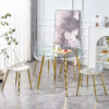 A glass tabletop with a diameter of 40 inches and a modern minimalist circular dining table with gold plated metal legs. 40 '* 40' * 30 ' DT-1164