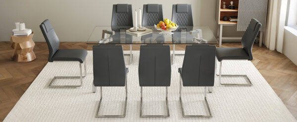 7da20b864dff49faa35b73576ed1e0fe_ceb363eef903db5767f6dab435887a78 Table and chair set.71 * 35.4 inch rectangular dining table.Tempered Glass Tabletop,Silver 7-shaped Metal Table Legs.Paried With 8 Dark Gray High-quality PU Chairs With Arched Metal Legs.