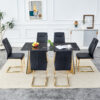 Table and chair set.63"x31.5x30"Black Texture With Lines Patterned Sintered Stone Table with Golden Stainless Steel Butterfly Legs.Paried With 6 Black High-quality PU Chairs With Golden Metal Legs.