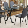 Table and chair set.79"x31.5" with X-shaped Black Metal Table Legs,Wood Grain Textured MDF Crossbeam.Paired With 8 Chairs Made Of Dark Gray Lnen Fabric.Iron pipe spraying Legs.