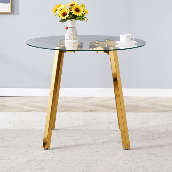 7ff94cd795b748c5bf03a9eb71863f0a_450d20b8acf6a126939f724227392bf0 Modern Luxurious Round Tempered Glass Dining Table with Gold 7-Shaped Metal Legs,suitable for family meals, office conferences, or as a casual coffee table for various occasions.36*36*29.5