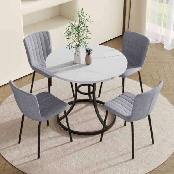 81c6e605230649d1b0d0ab5ff4db33a1_53bda176fb4b6e98d4a173b784b3b9c8 Table and chair set.A Modern Minimalist Circular Dining Table With A Diameter Of 33.3 Inches.Paired With 4 High Quality Light Gray Dining Chairs Made Of Linen Fabric.Iron pipe spraying Legs.