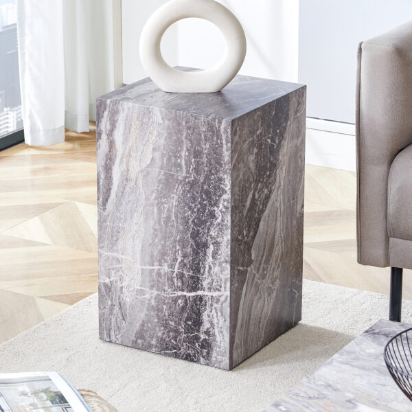 Elevate your living space with this modern MDF coffee table, which showcases gray textured patterns. It is characterized by stylish design.