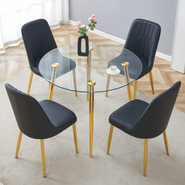 Table and chair set.A 42 Inch Diameter Modern Minimalist Round Dining Table With Transparent Tempered Glass top And Golden Metal Legs,4 Black Chairs With PU Backrest And Seat Cushion.