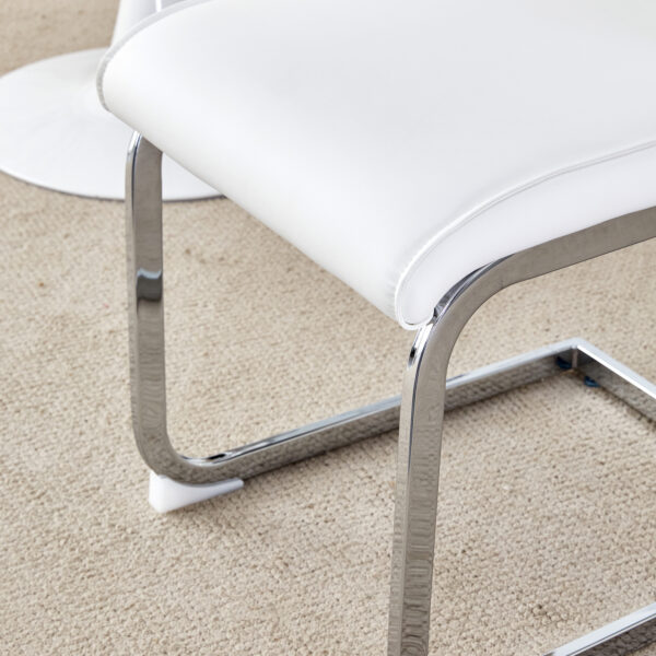 8361f2e28c384baaba180b830b5408f2_1cdc7f9945d68012bae0f59e5ad195dd Table and chair set.63"*35.4" White Imitation Marble Pattern MDF Dining Table Set - 4 Soft and Comfortable White PU Chair With Arched Metal Silver Leg.Create Your Exclusive Low-Key Luxury Space.