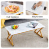 A coffee table made of rock slab material, with a smooth and natural surface that complements the modern design of the golden metal legs, making it suitable for living rooms of all sizes.47*23.6