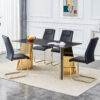 Table and chair set.63"x31.5x30"Black Texture With Lines Patterned Sintered Stone Table with Golden Stainless Steel Butterfly Legs.Paried With 4 Black High-quality PU Chairs With Golden Metal Legs.